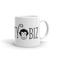 white mug with black and white MonketyBiz logo in curvy font including Monkety Monk face. View shows "TY" and the monkey's face and "BIZ" 